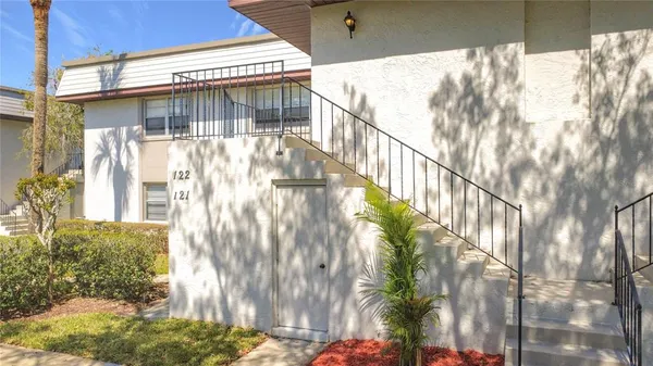 a view of balcony with wooden floor