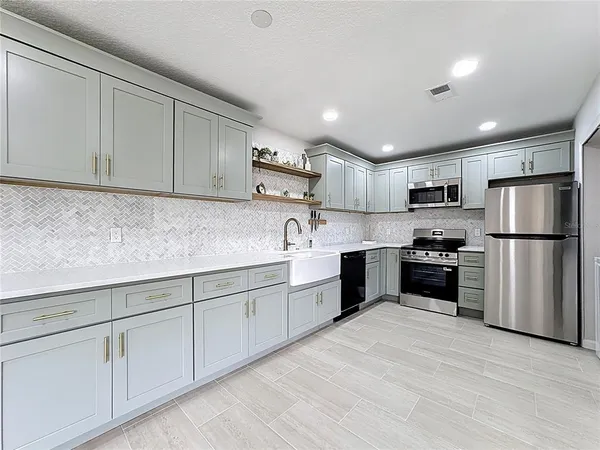 $229,995 | 122 Windtree Lane, Unit O204, Winter Garden, FL 34787