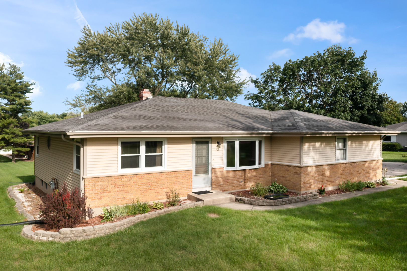7N641 Stevens Road St. Charles, IL 60175 - Photo 1 of 1 a view of a house with a yard potted plants and large tree