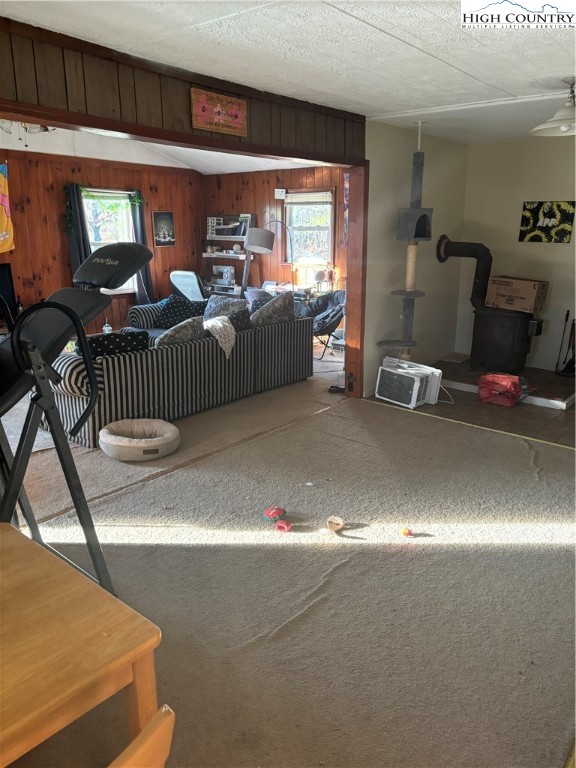 328 Clint Lewis Road Boone, NC 28607 - Photo 14 of 25 a living room with furniture a rug and white walls