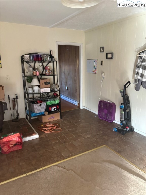 328 Clint Lewis Road Boone, NC 28607 - Photo 18 of 25 a bedroom with a bed and gym equipment