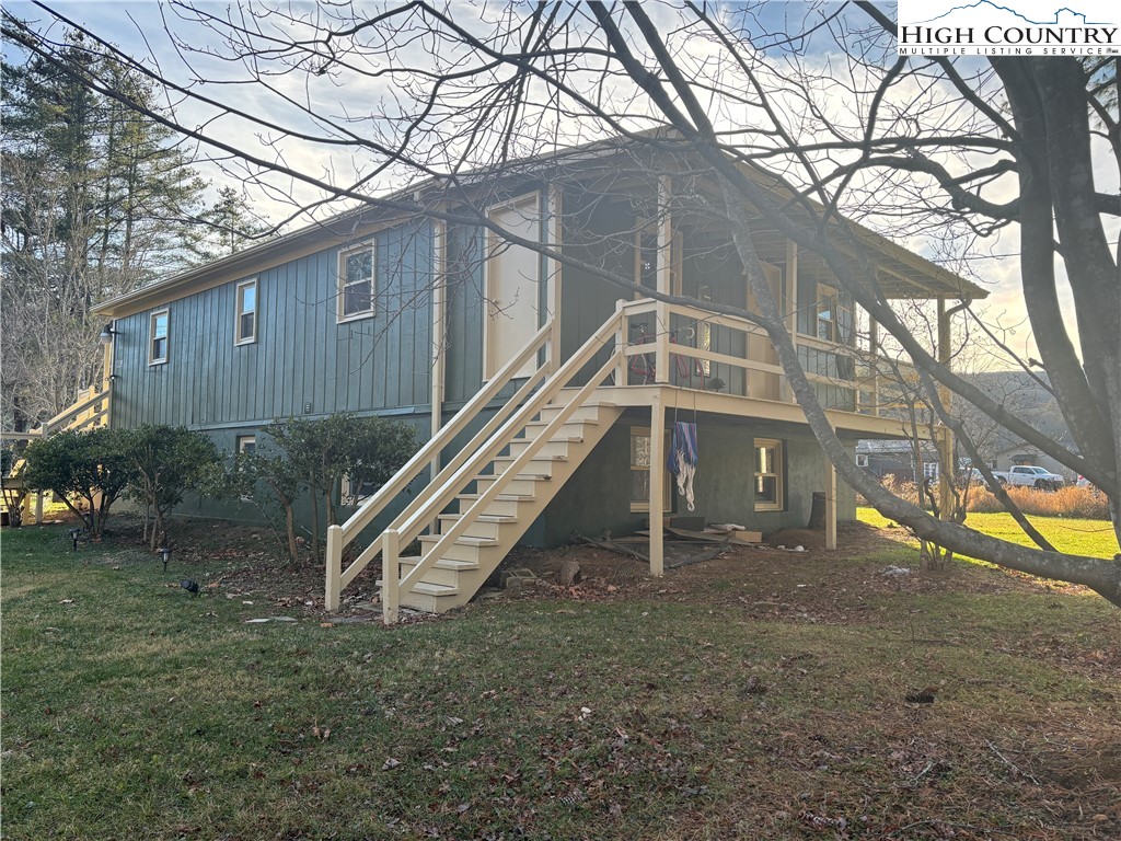 328 Clint Lewis Road Boone, NC 28607 - Photo 24 of 25 a view of a house with a yard