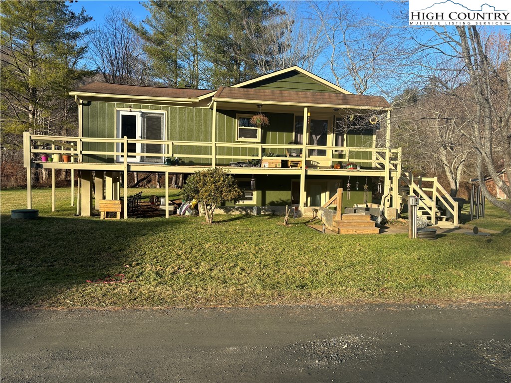 328 Clint Lewis Road Boone, NC 28607 - Photo 4 of 25 a front view of a house with a yard