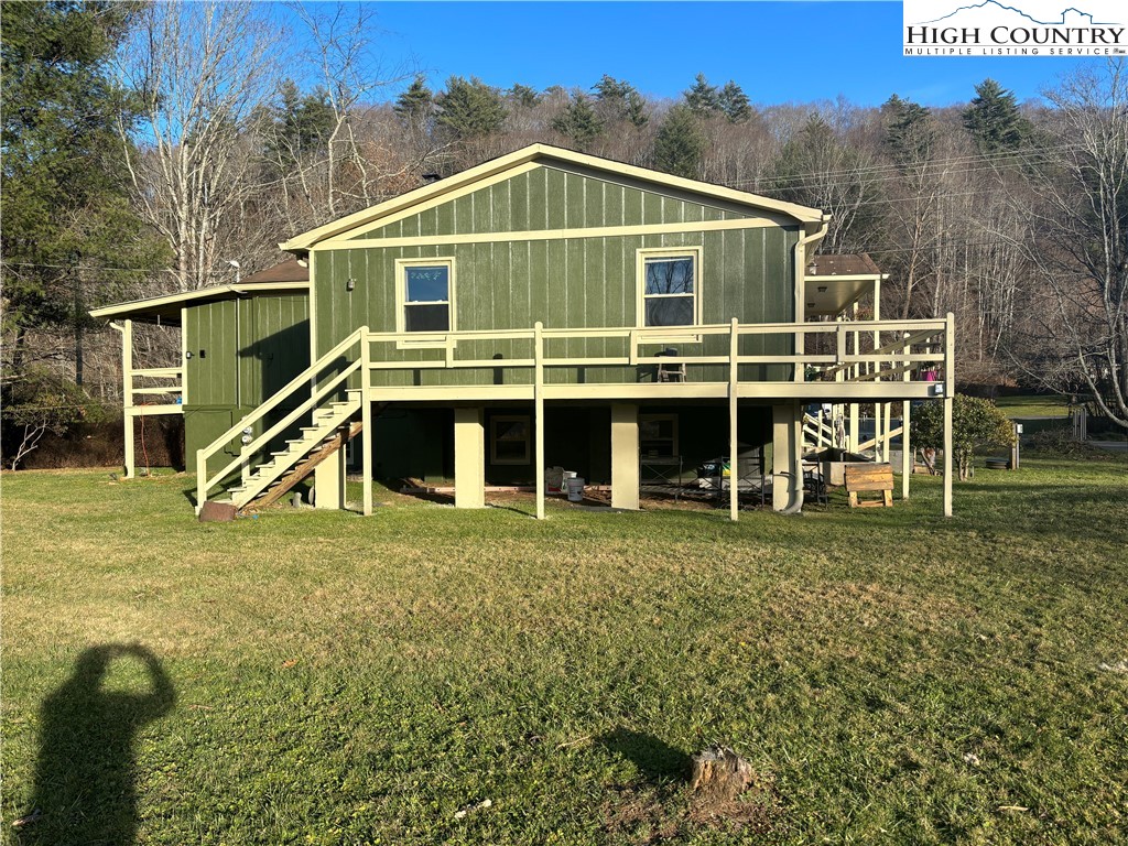 328 Clint Lewis Road Boone, NC 28607 - Photo 5 of 25 a front view of a house with a yard