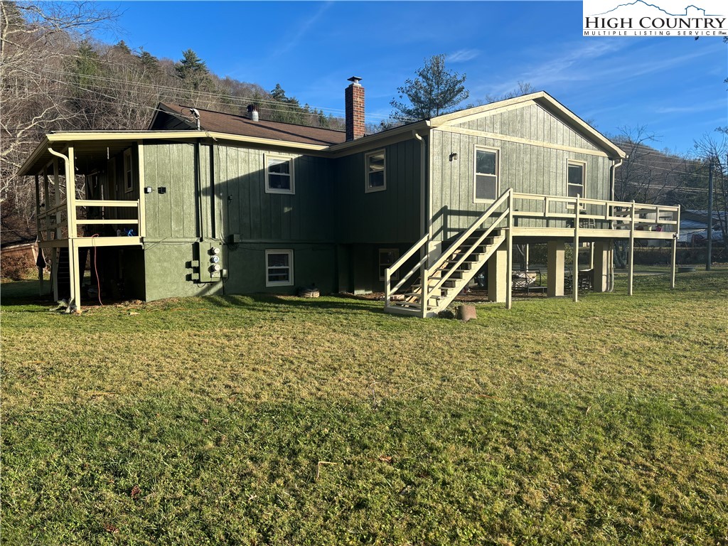 328 Clint Lewis Road Boone, NC 28607 - Photo 7 of 25 a front view of a house with a yard