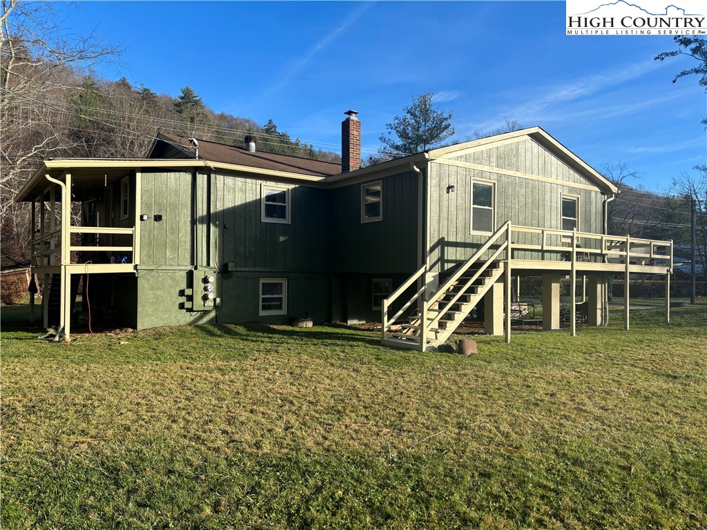 328 Clint Lewis Road Boone, NC 28607 - Photo 8 of 25 a view of a house with a yard