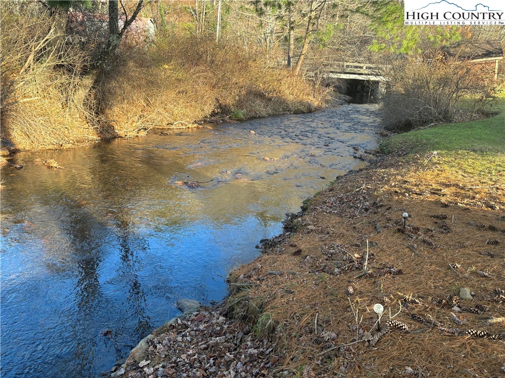 328 Clint Lewis Road Boone, NC 28607 - Photo 10 of 25 a view of a yard with wooden fence