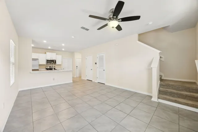 a view of a kitchen with a sink and dishwasher