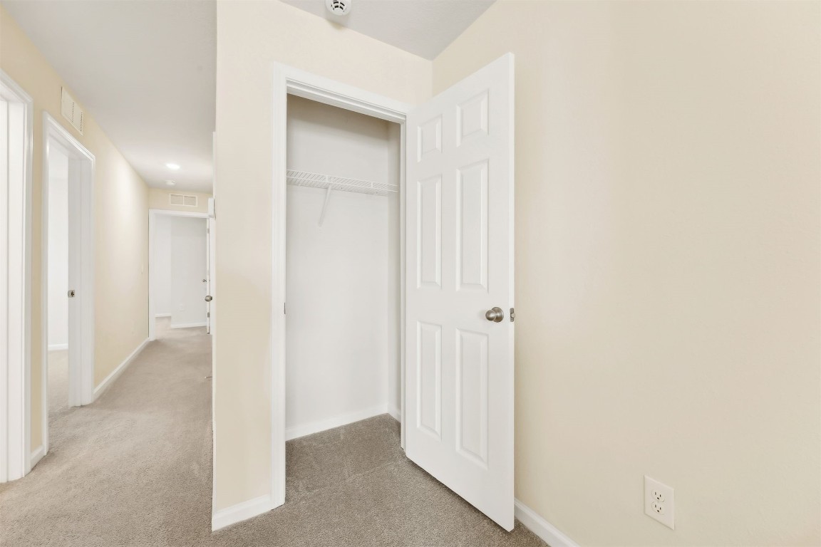 86440 Shortline Circle Yulee, FL 32097 - Photo 22 of 50 a view of a hallway with wooden floor