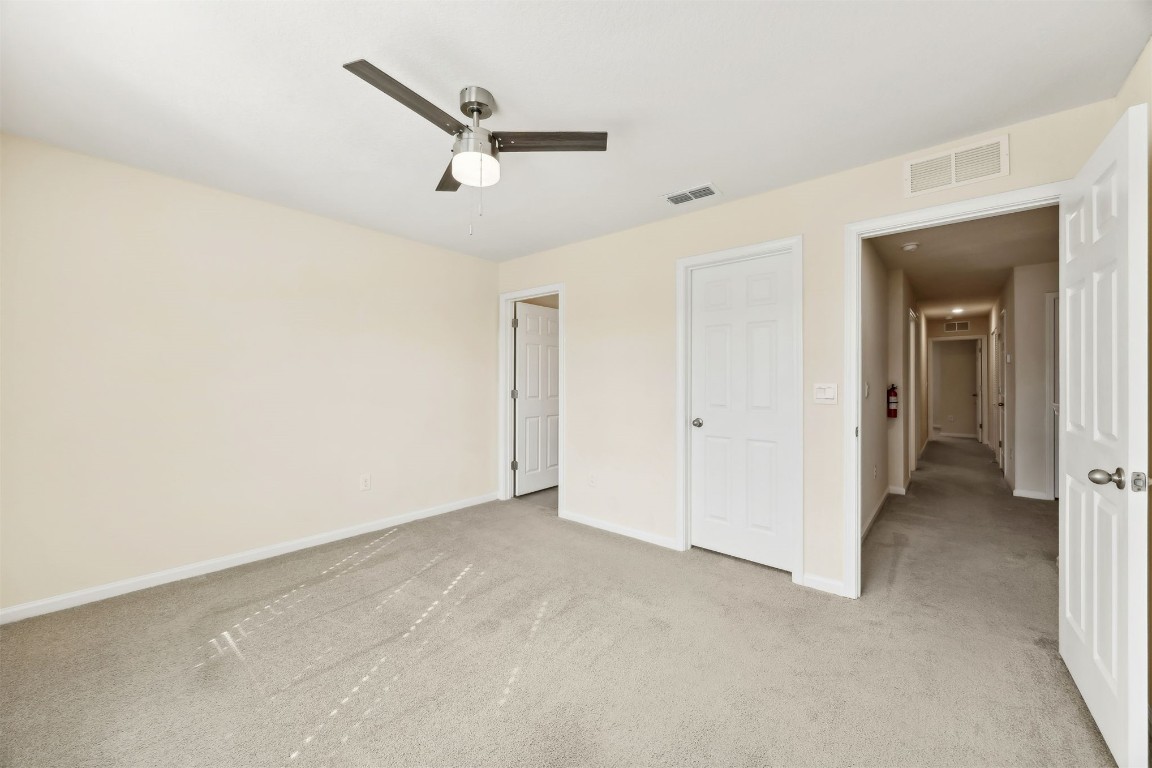 86440 Shortline Circle Yulee, FL 32097 - Photo 24 of 50 a view of a livingroom with a ceiling fan and wooden floor