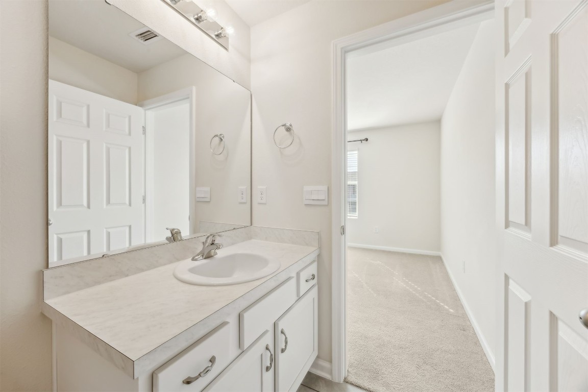 86440 Shortline Circle Yulee, FL 32097 - Photo 26 of 50 a bathroom with a sink and a mirror
