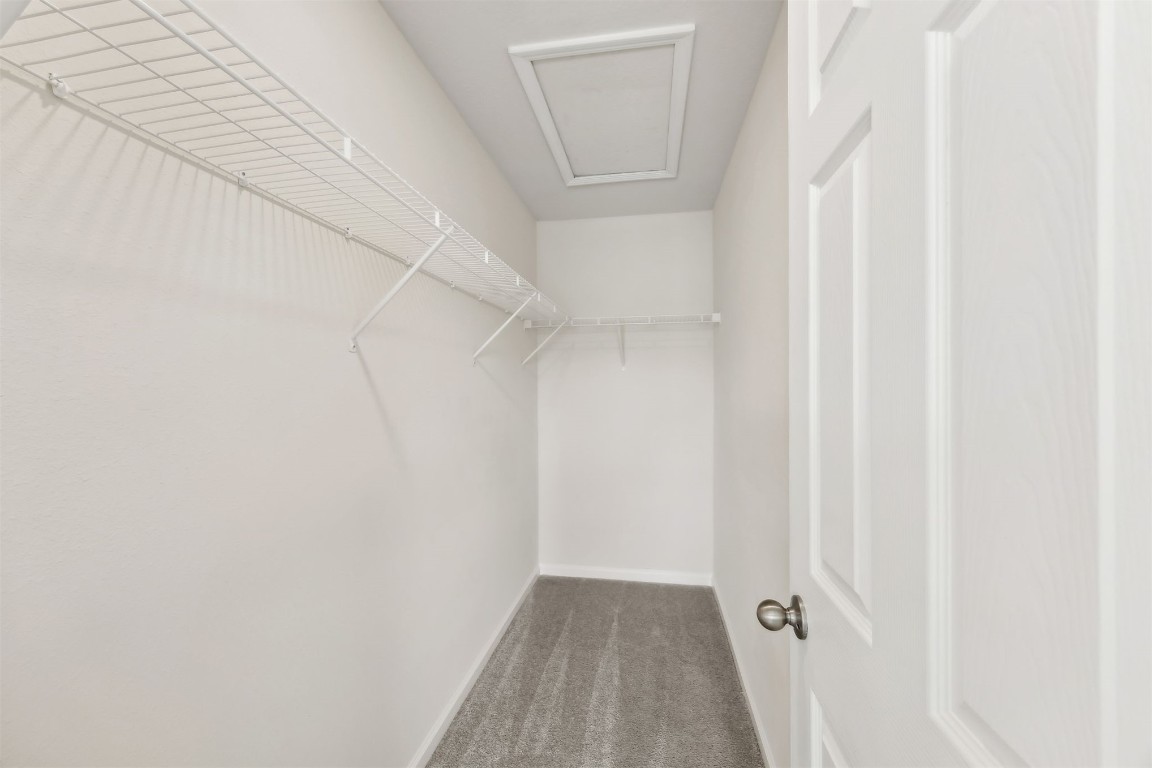86440 Shortline Circle Yulee, FL 32097 - Photo 29 of 50 a view of a room with racks on the wall