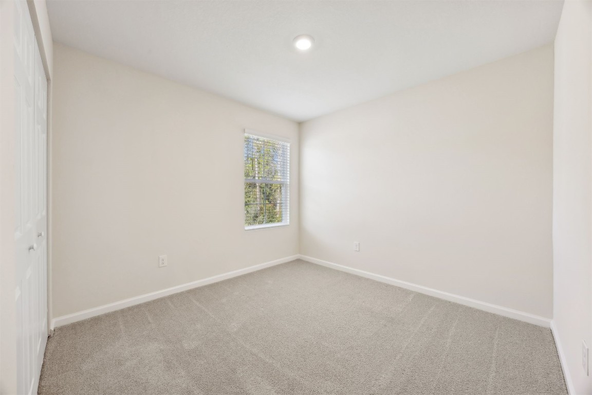 86440 Shortline Circle Yulee, FL 32097 - Photo 30 of 50 an empty room with windows