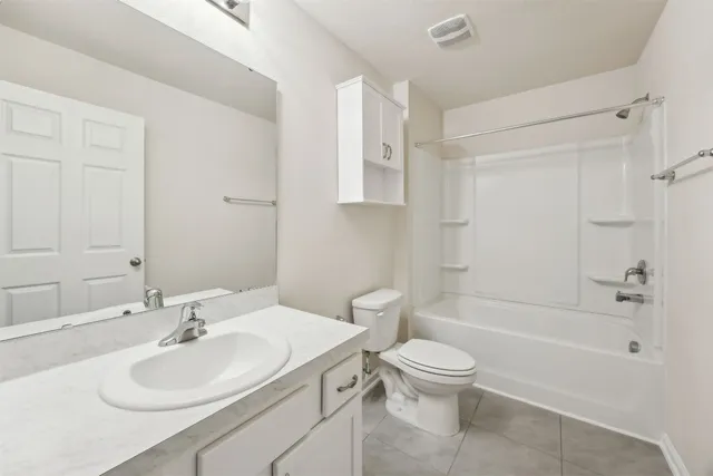 a bathroom with a sink a vanity and a mirror