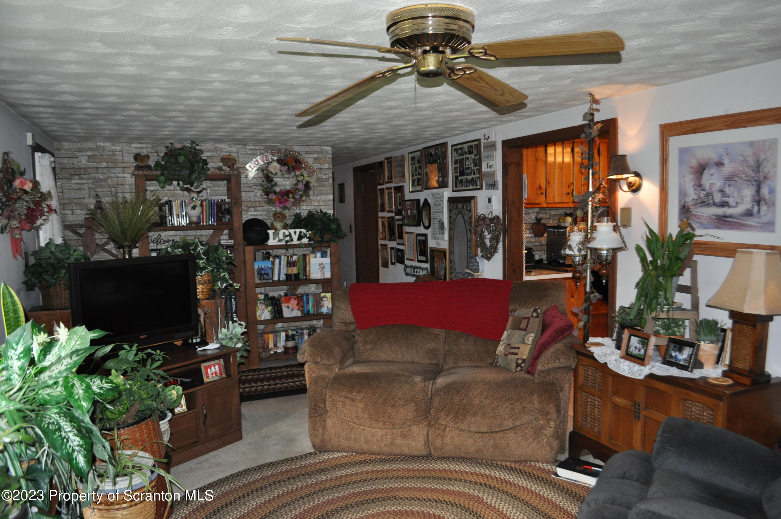 386 Scott Center Road Starrucca, PA 18462 - Photo 12 of 21 Living Room Loking into hallway