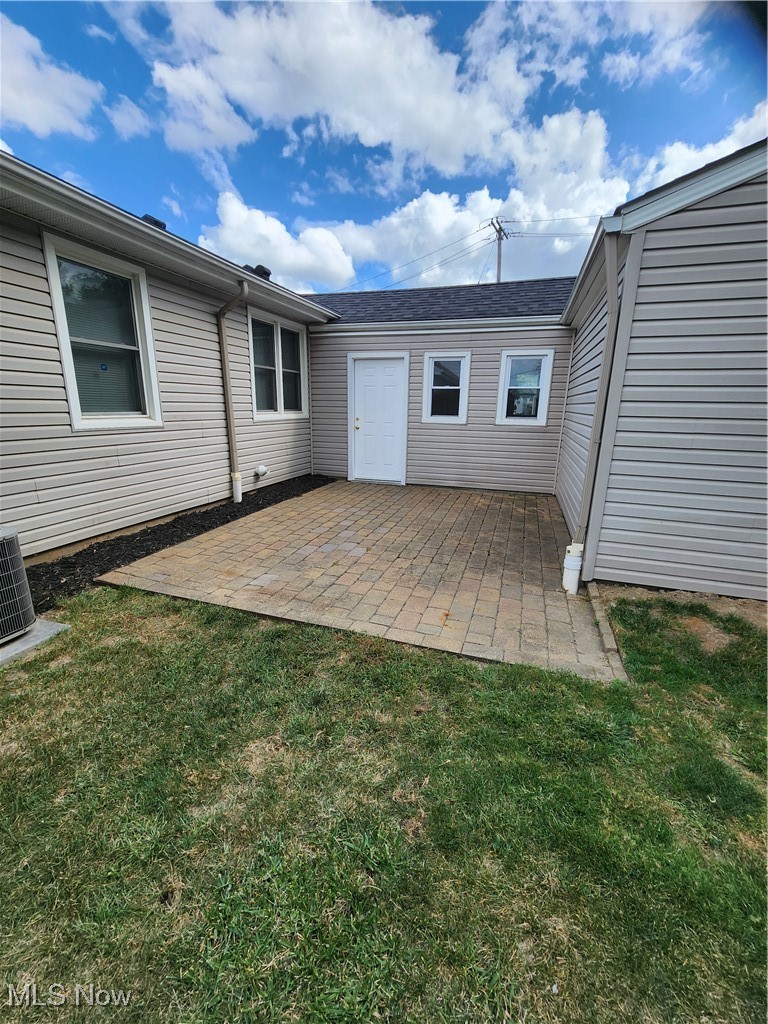 9716 Alexander Road Garfield Heights, OH 44125 - Photo 18 of 19 Access to Patio from 3 Seasons Room