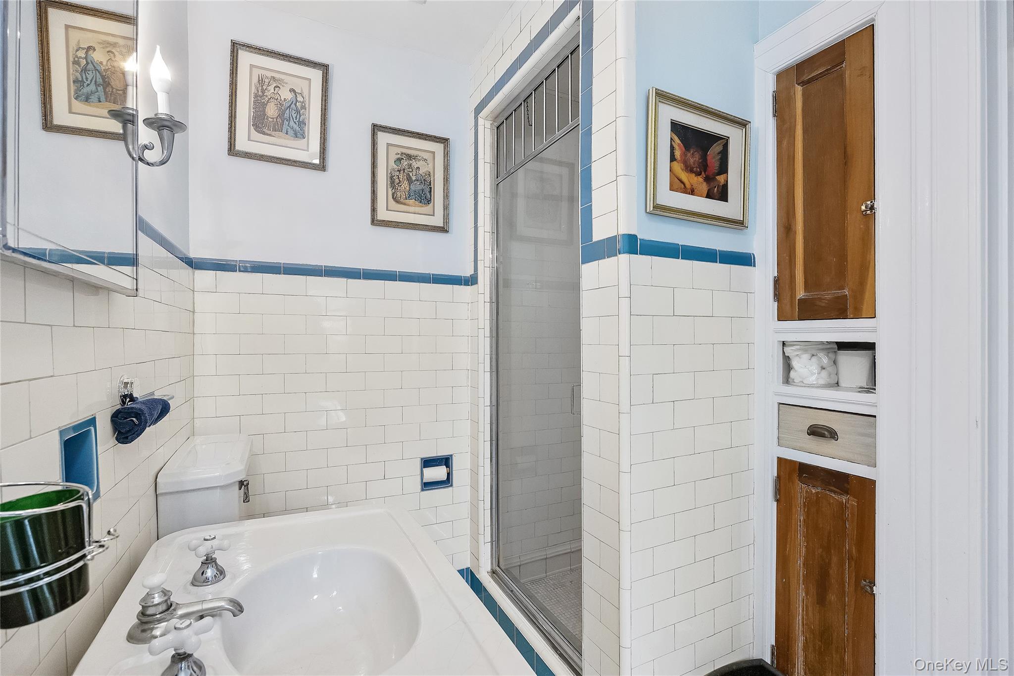 1-27 Beverly Road Queens, NY 11363 - Photo 43 of 46 a bathroom with a bathtub and shower