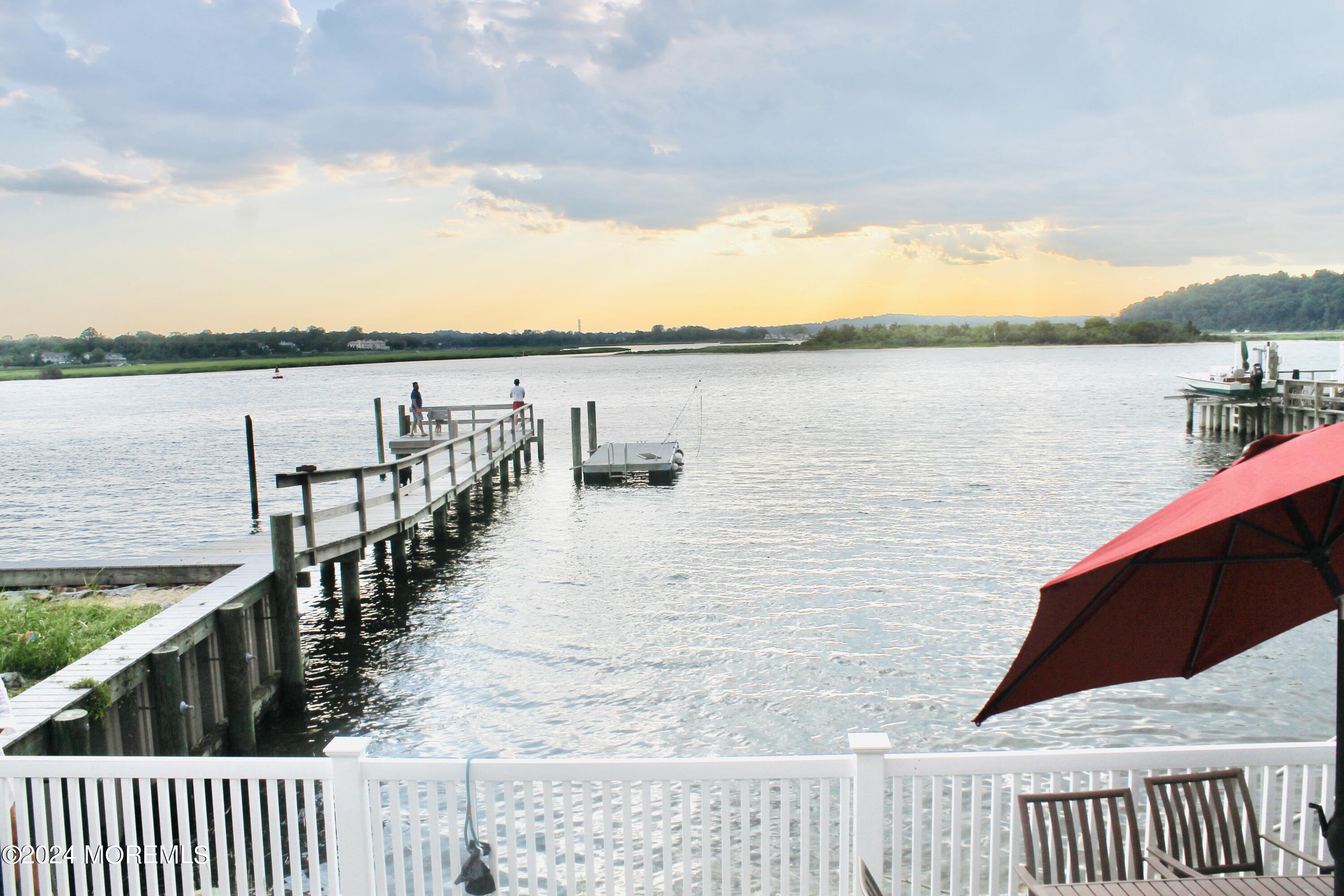 4 Riverview Place Sea Bright, NJ 07760 - Photo 11 of 17 a terrace view with two chairs in front of it