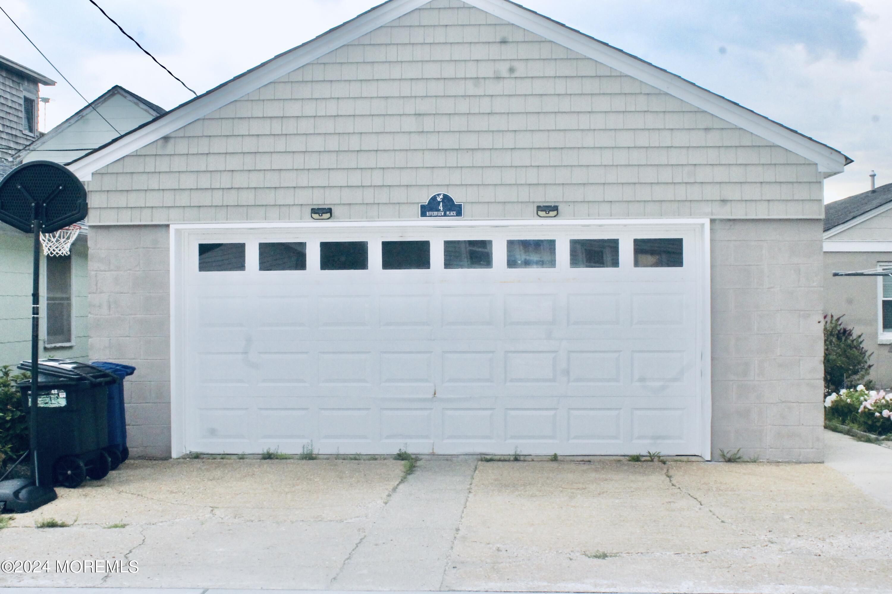 4 Riverview Place Sea Bright, NJ 07760 - Photo 16 of 17 a view of a house with garage
