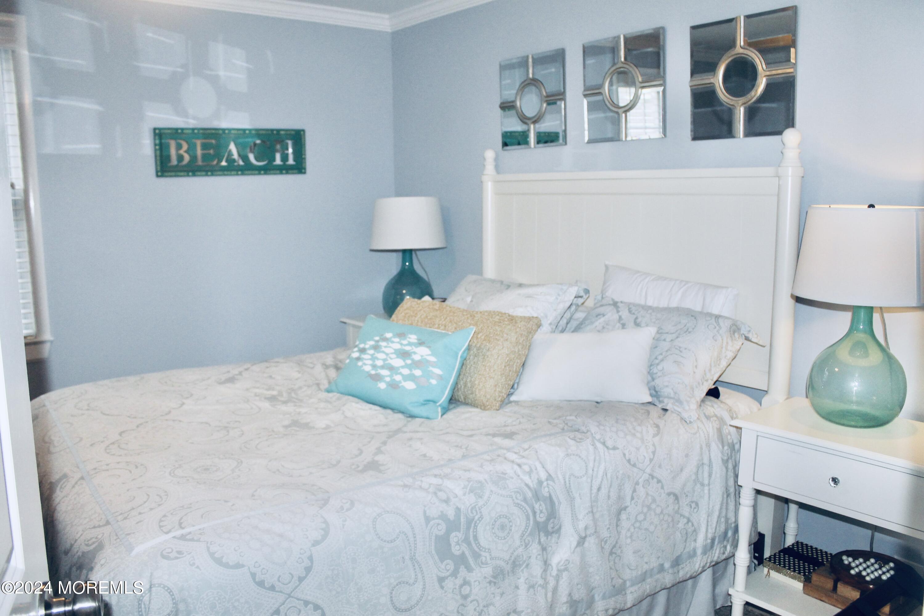 4 Riverview Place Sea Bright, NJ 07760 - Photo 9 of 17 a large white bed in a white room