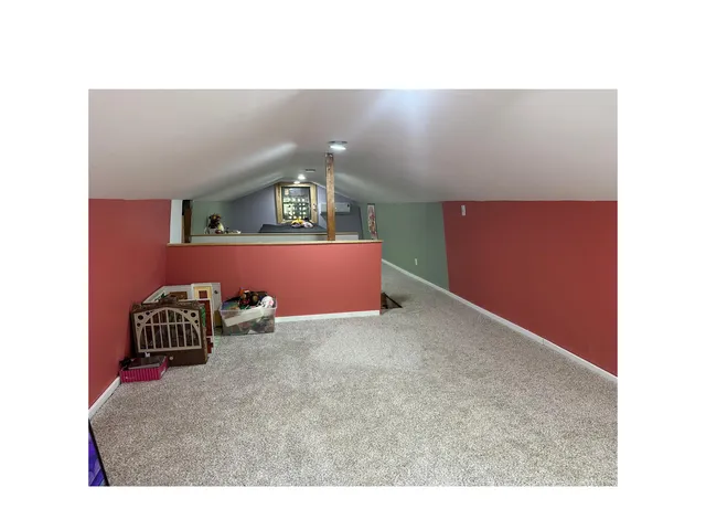 a black and white photo of a bedroom