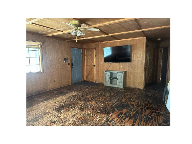 a bathroom with a sink and a refrigerator