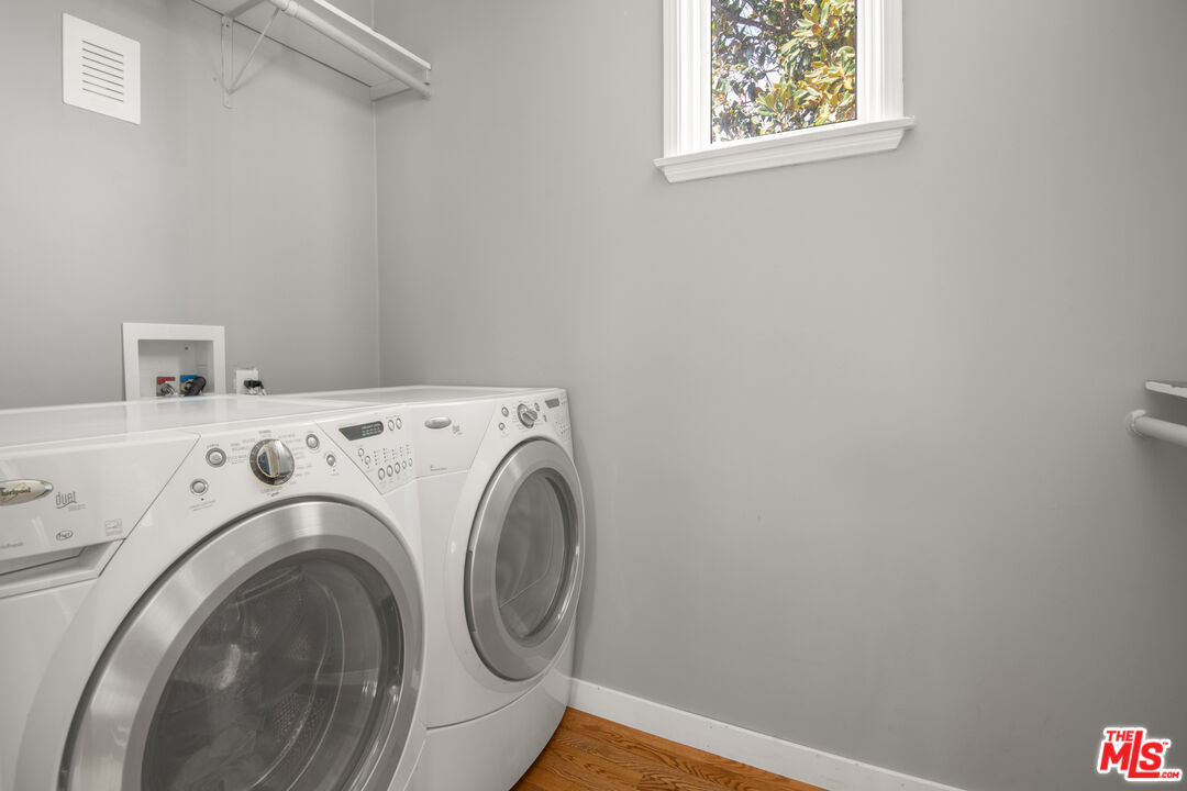 6218 Balcom Avenue Encino, CA 91316 - Photo 16 of 22 a utility room with dryer and washer