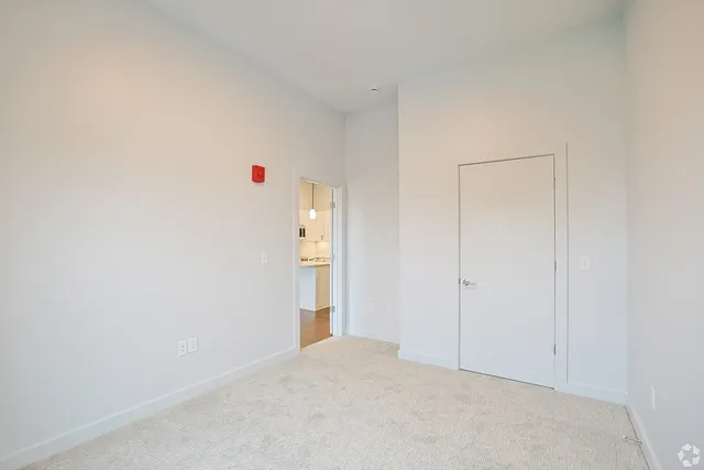 a very nice looking room with white walls