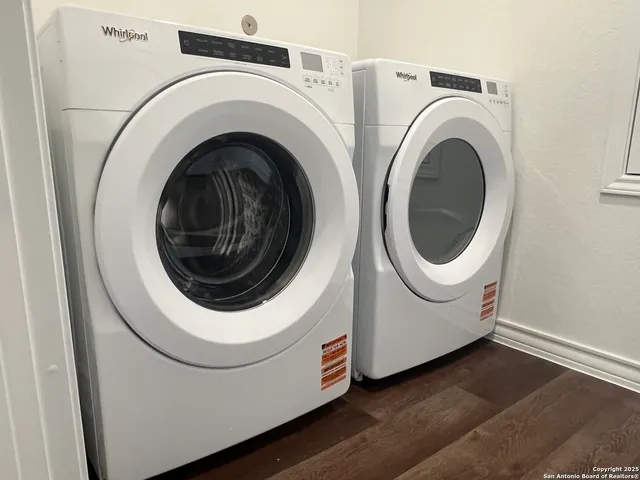 a utility room with dryer and washer