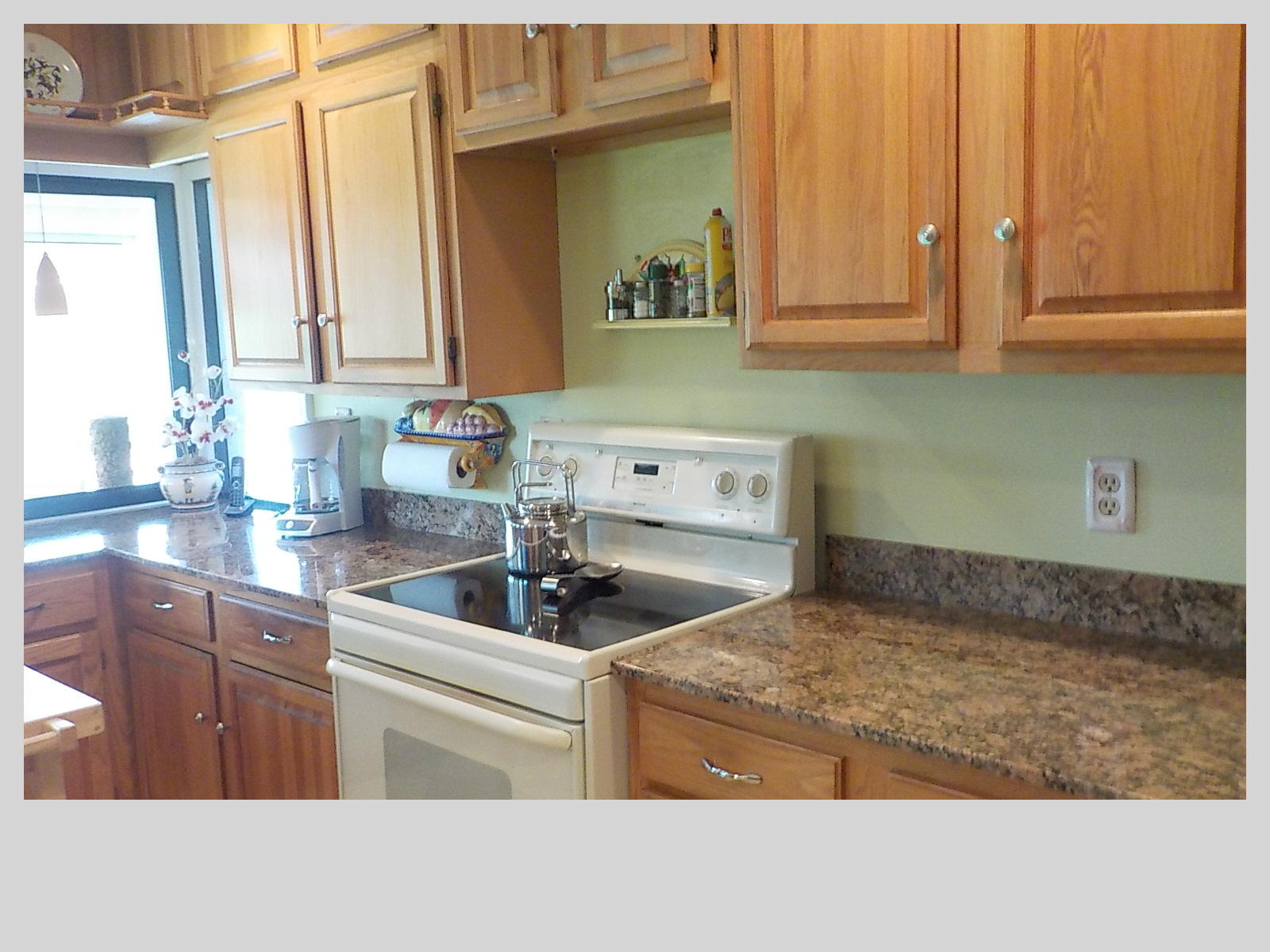 2159 Southeast Erwin Road Port St. Lucie, FL 34952 - Photo 10 of 48 a kitchen with stainless steel appliances granite countertop a sink a stove and dishwasher