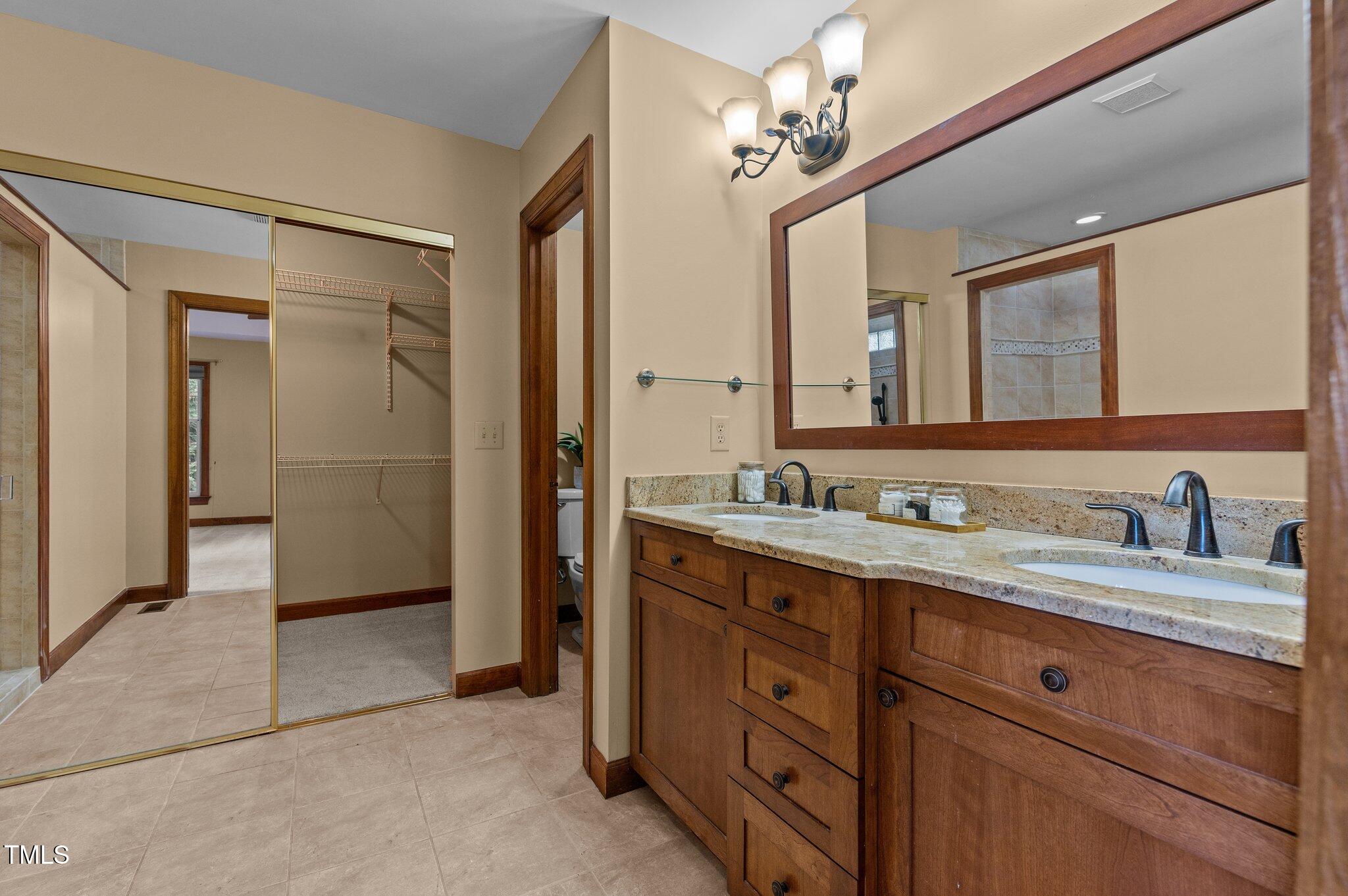 5621 Raddington Street Raleigh, NC 27613 - Photo 22 of 34 Primary Bath