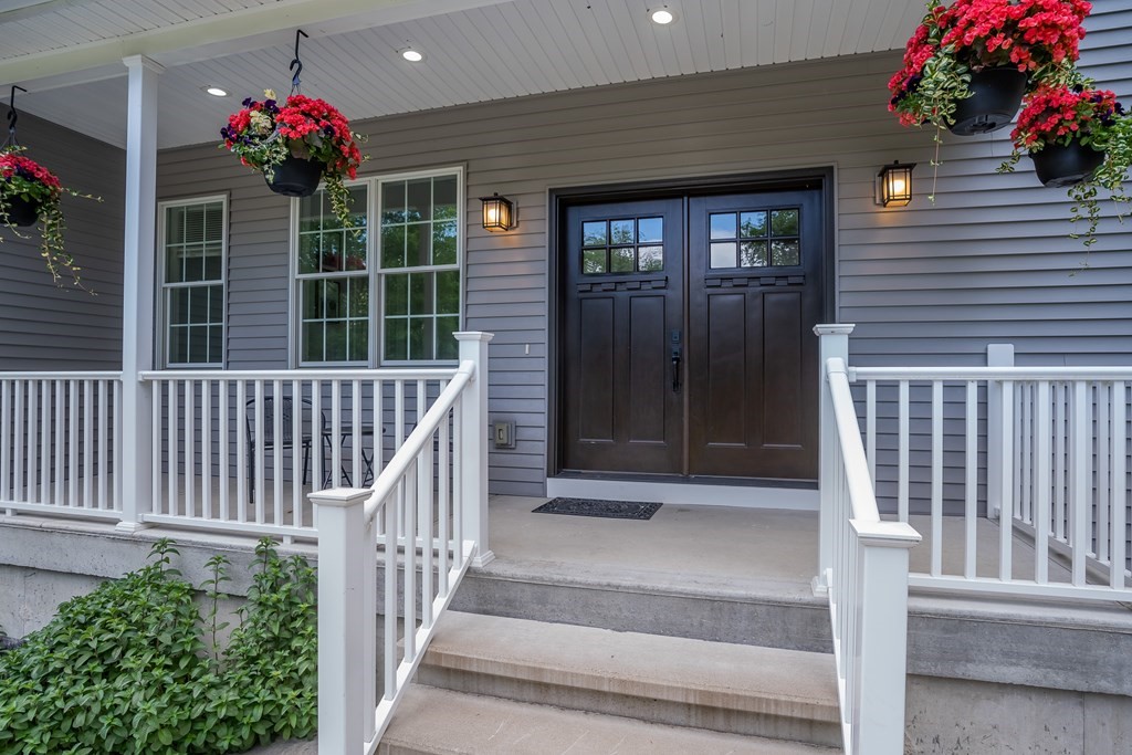 77 Jourdan Road Montgomery, MA 01085 - Photo 12 of 42 a view of front door and porch with wooden floor