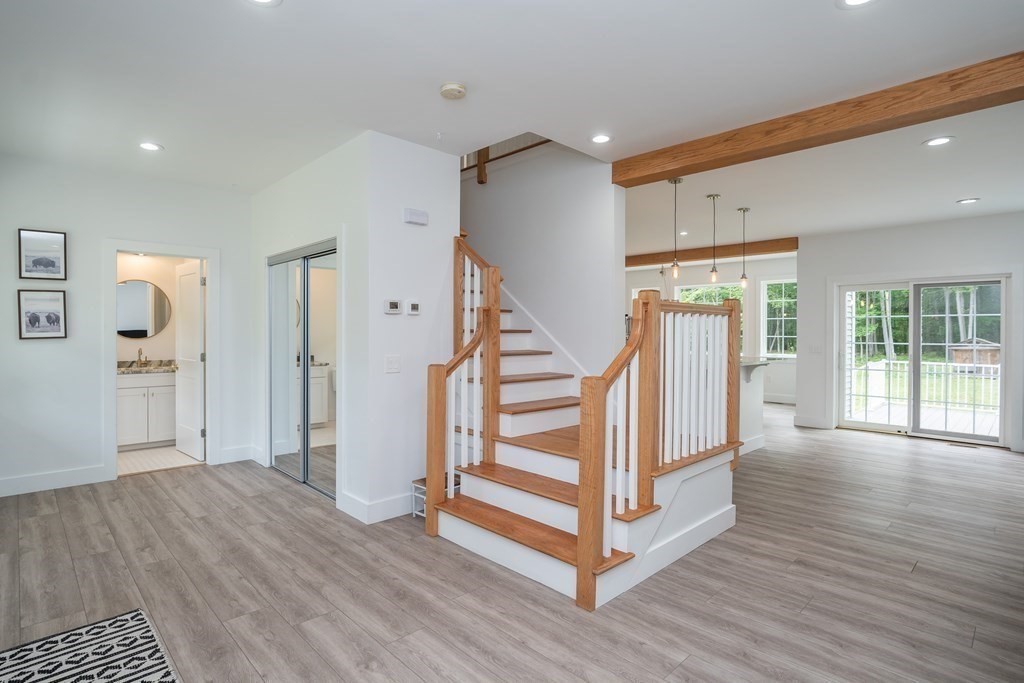 77 Jourdan Road Montgomery, MA 01085 - Photo 27 of 42 a view of entryway with wooden floor and livingroom
