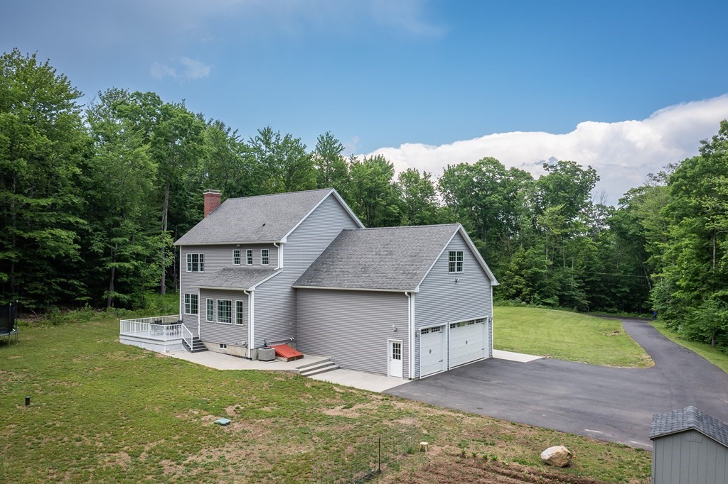 77 Jourdan Road Montgomery, MA 01085 - Photo 3 of 42 an aerial view of a house with swimming pool table and chairs