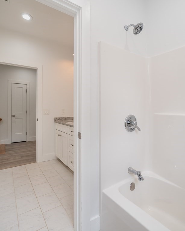 77 Jourdan Road Montgomery, MA 01085 - Photo 37 of 42 a bathroom with a bathtub and a shower