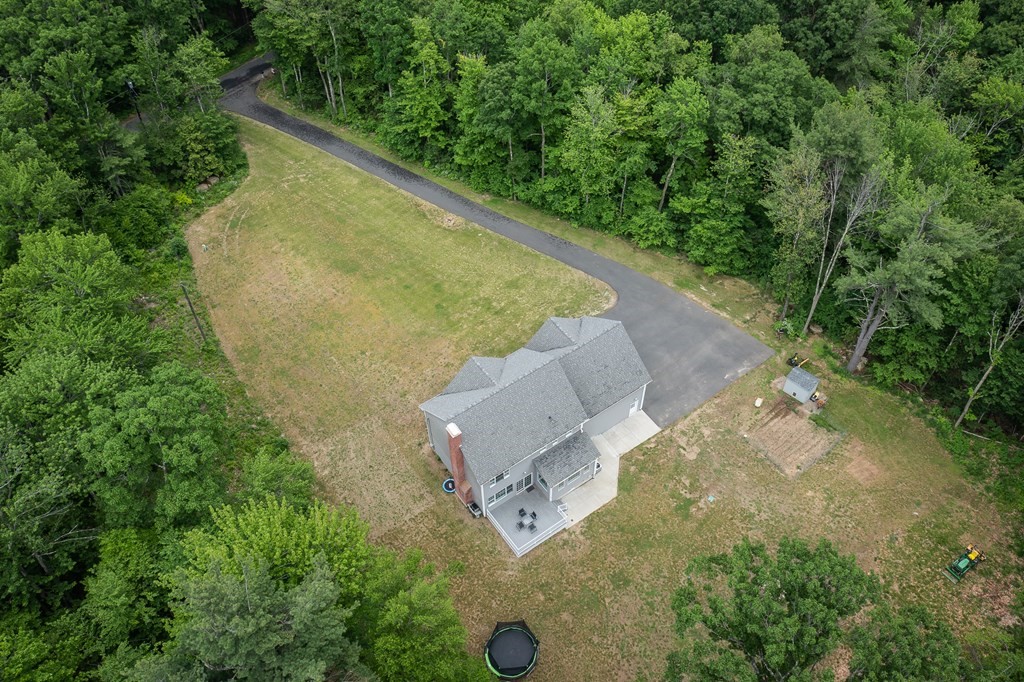 77 Jourdan Road Montgomery, MA 01085 - Photo 7 of 42 an aerial view of residential house with outdoor space and trees all around
