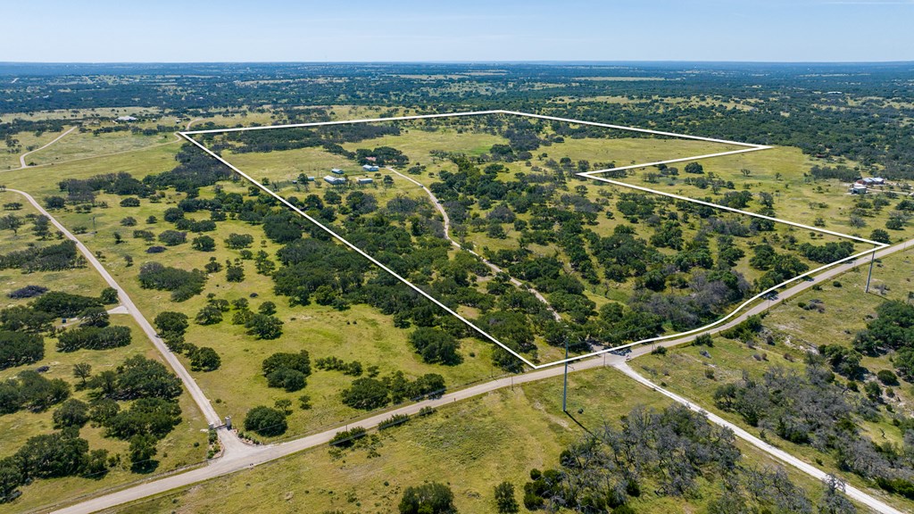 315 Rieger Road Harper, TX 78631 - Photo 2 of 31 a view of a city and an ocean view