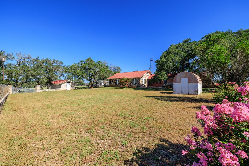 315 Rieger Road Harper, TX 78631 - Photo 10 of 31 a front view of house with yard and swimming pool