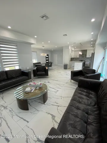 a living room with furniture and a couch