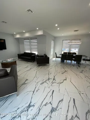 a room with furniture and a couch