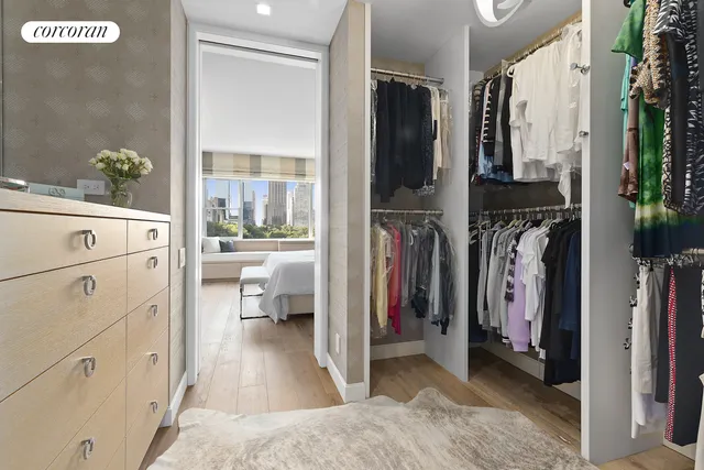 a bedroom with a bed and a night stand