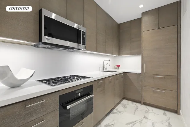 a living room with furniture rug and window