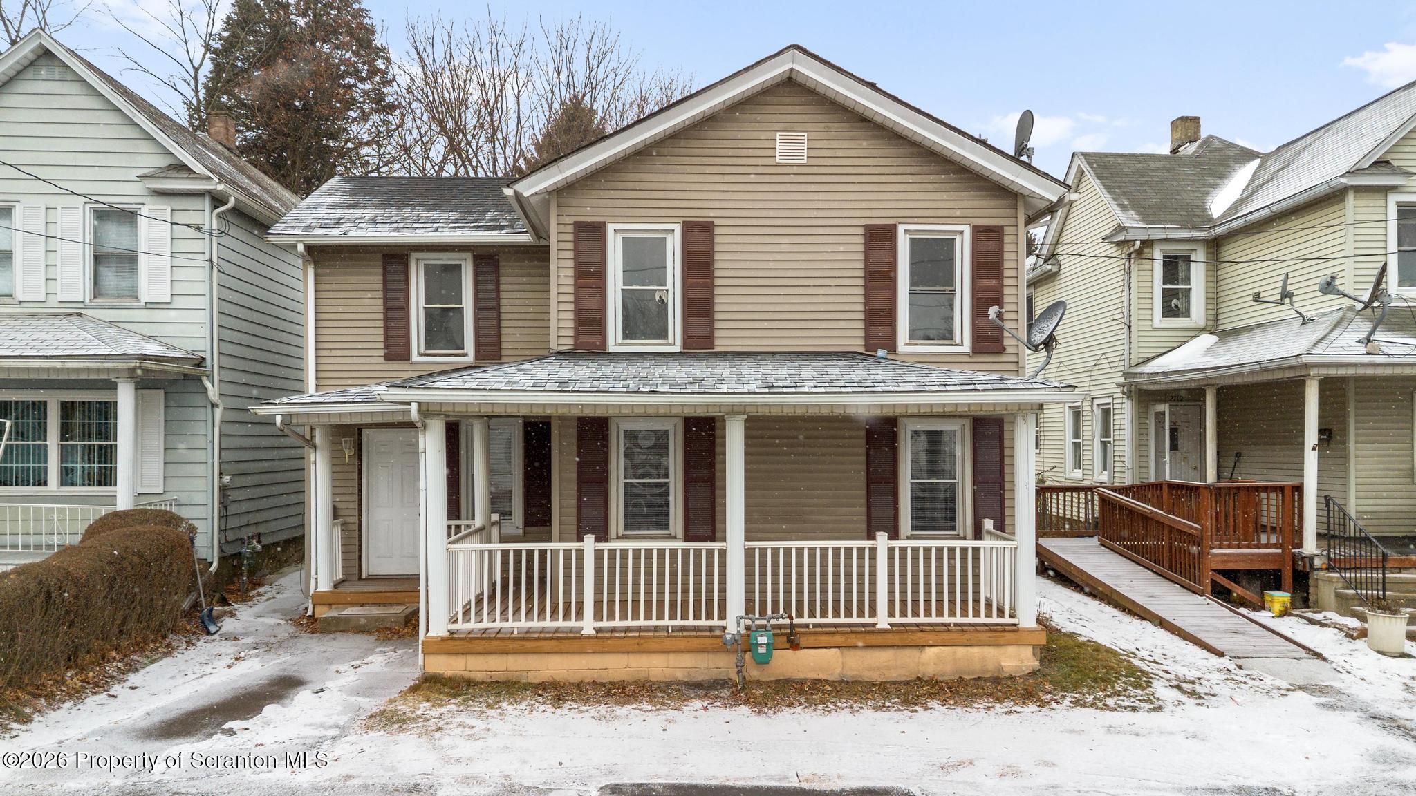 2717 North Main Avenue Scranton, PA 18508 - Photo 2 of 36 a view of a white house with a outdoor space