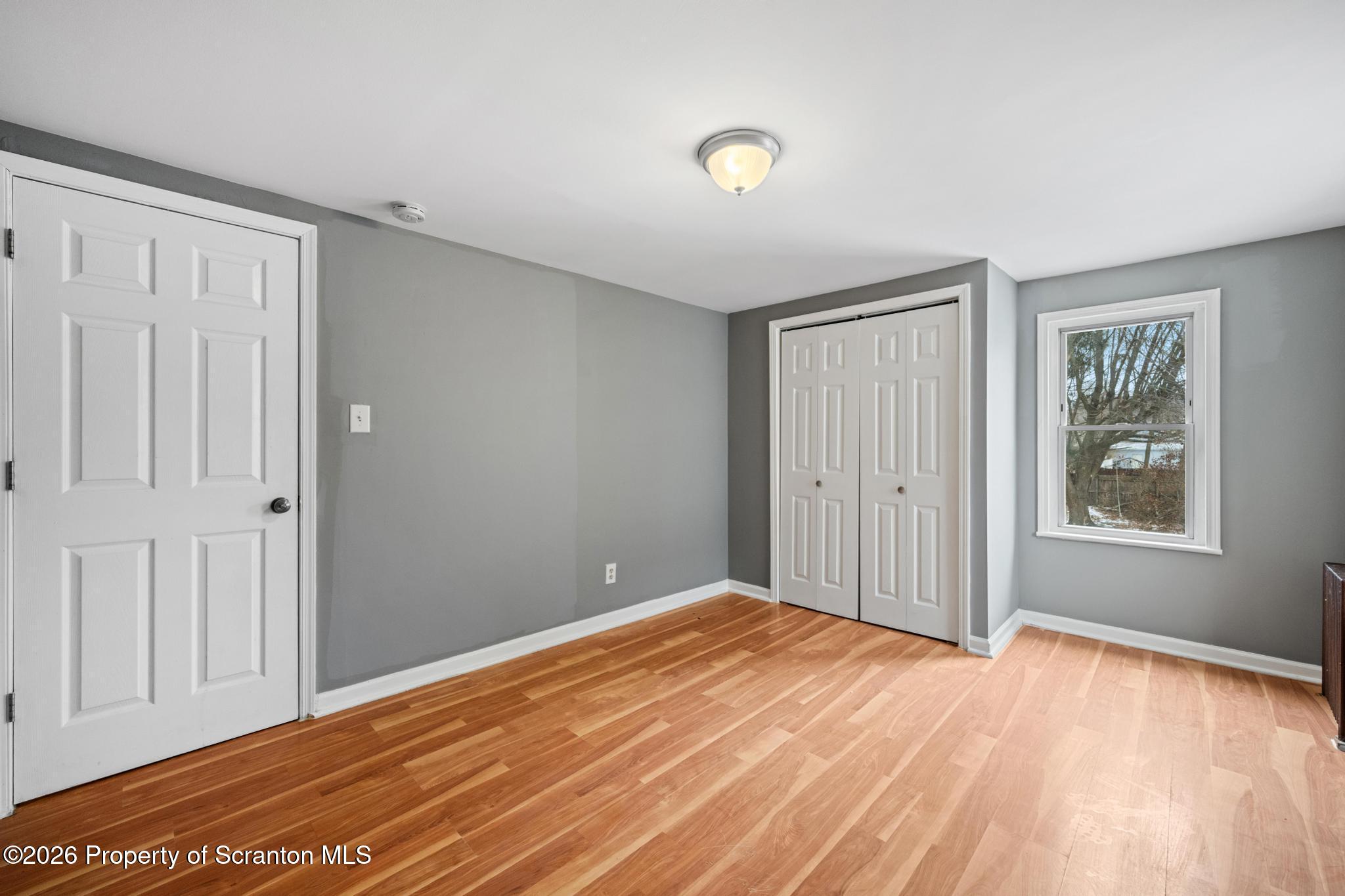 2717 North Main Avenue Scranton, PA 18508 - Photo 26 of 36 a view of empty room with wooden floor