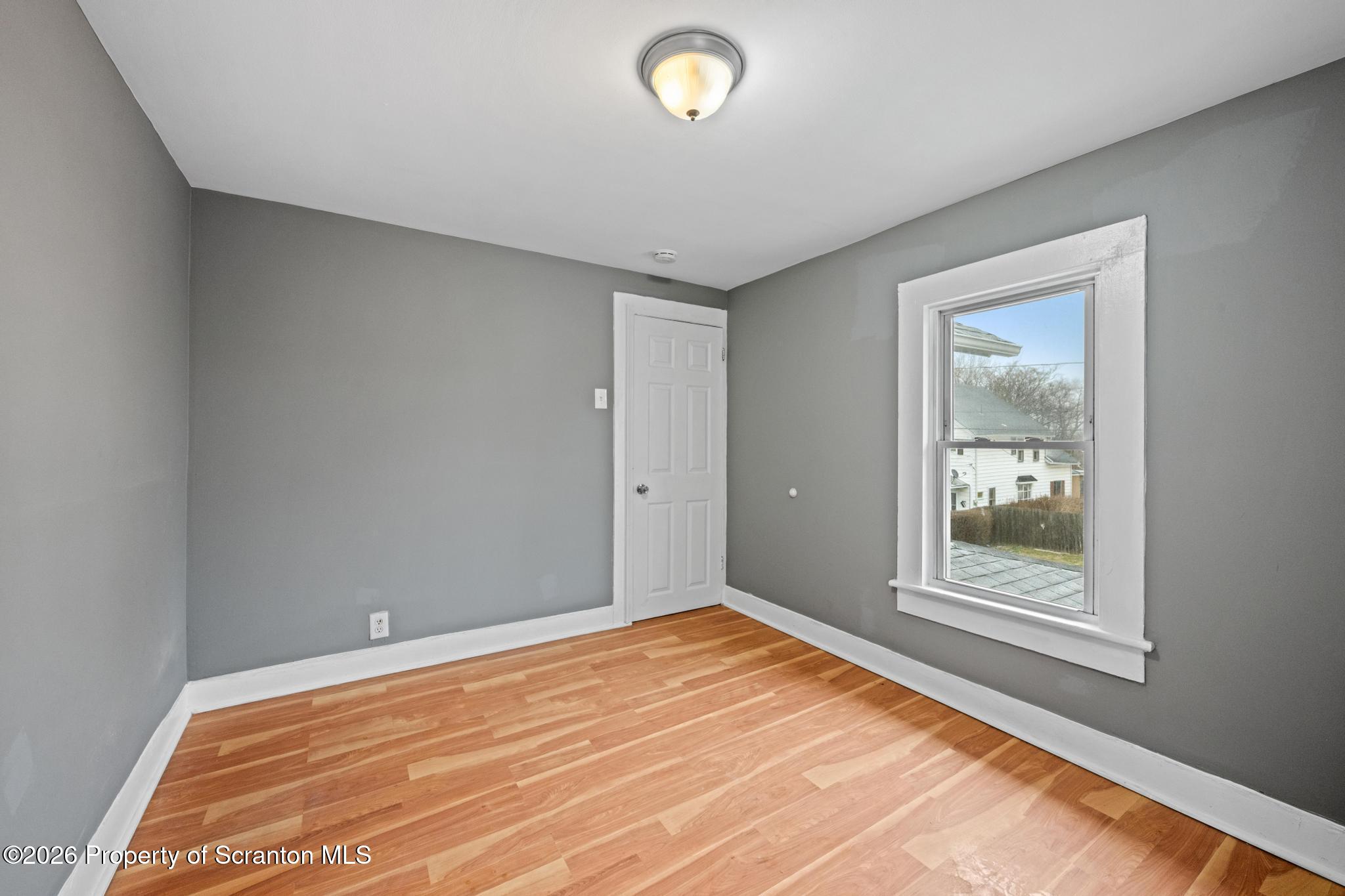 2717 North Main Avenue Scranton, PA 18508 - Photo 30 of 36 a view of an empty room with window and closet area