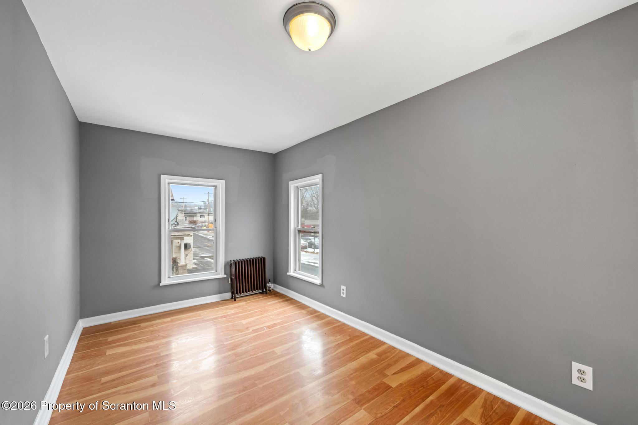 2717 North Main Avenue Scranton, PA 18508 - Photo 31 of 36 an empty room with windows