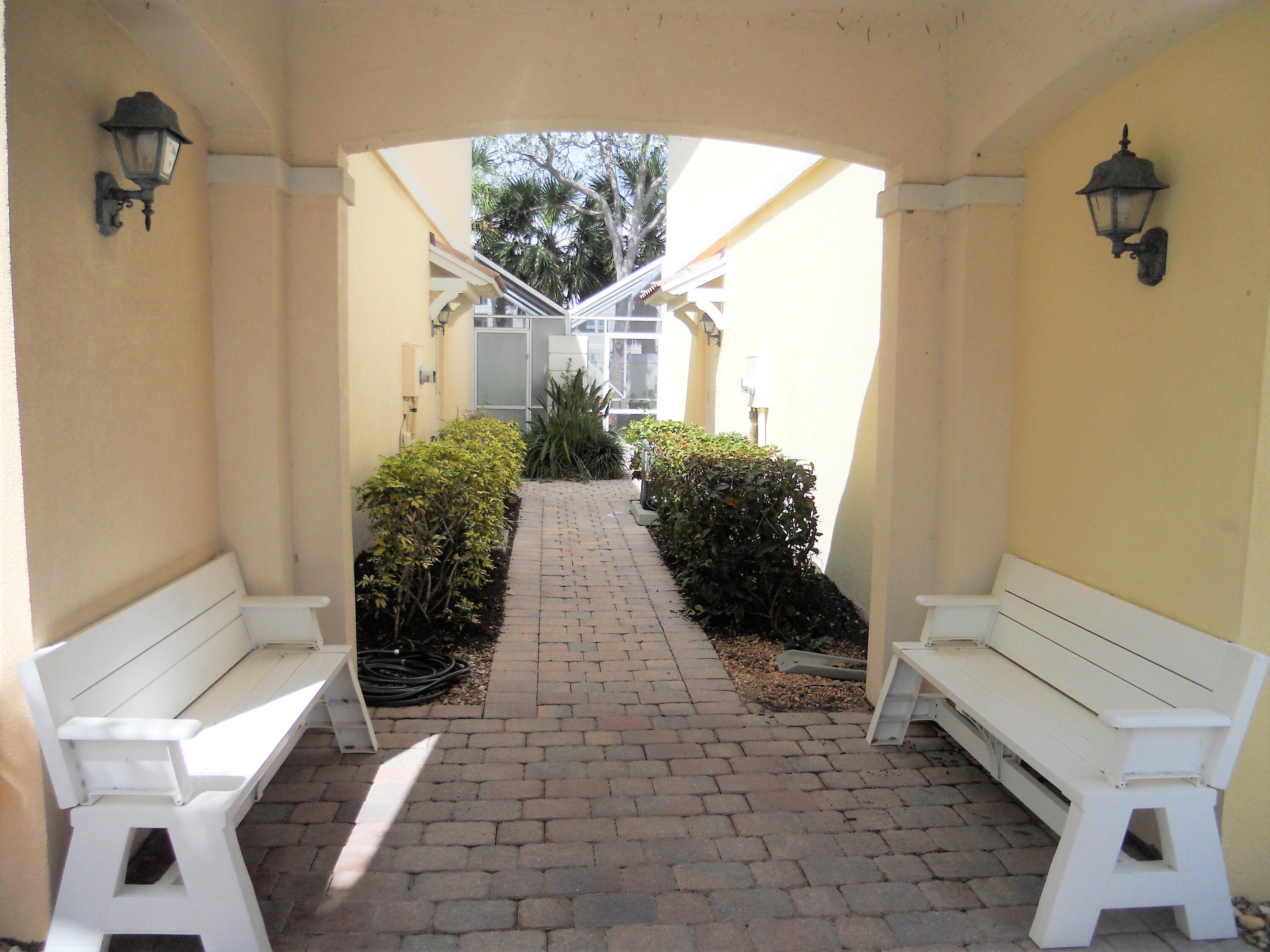 482 Capistrano Drive Palm Beach Gardens, FL 33410 - Photo 2 of 9 a view of a entryway