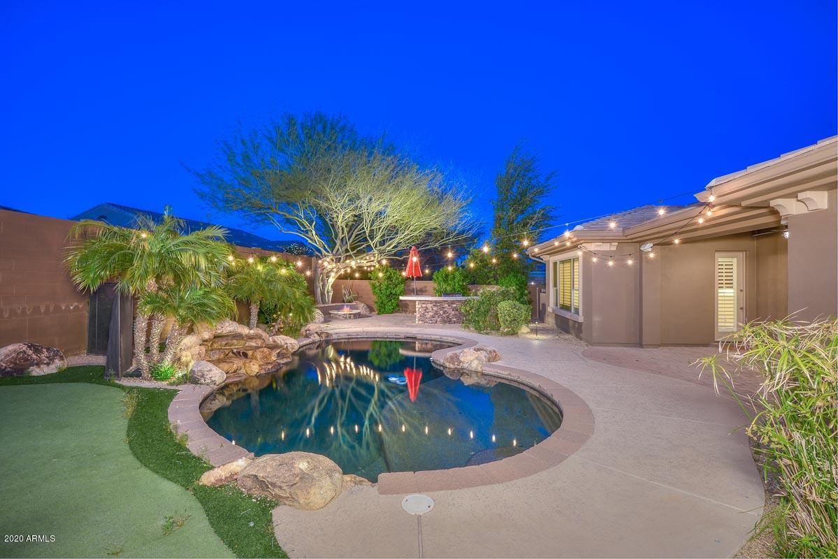1818 West Sleepy Ranch Road Phoenix, AZ 85085 - Photo 36 of 76 Night-Backyard-Pool