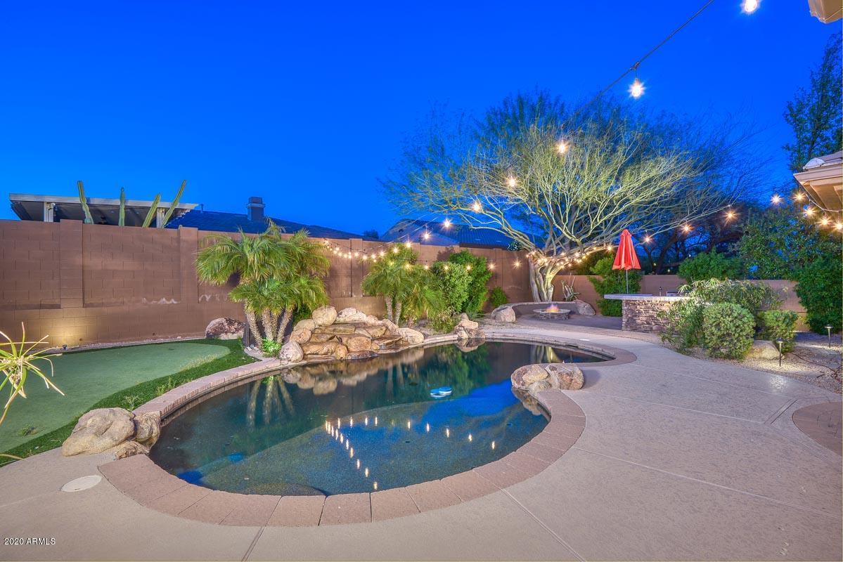 1818 West Sleepy Ranch Road Phoenix, AZ 85085 - Photo 39 of 76 Night-Pool-Backyard