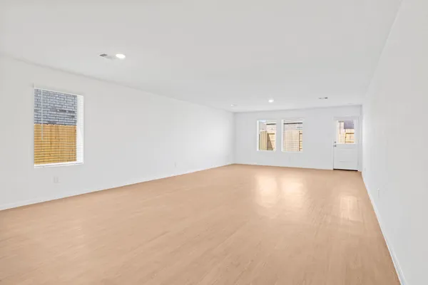 a backyard of a house with lots of green space